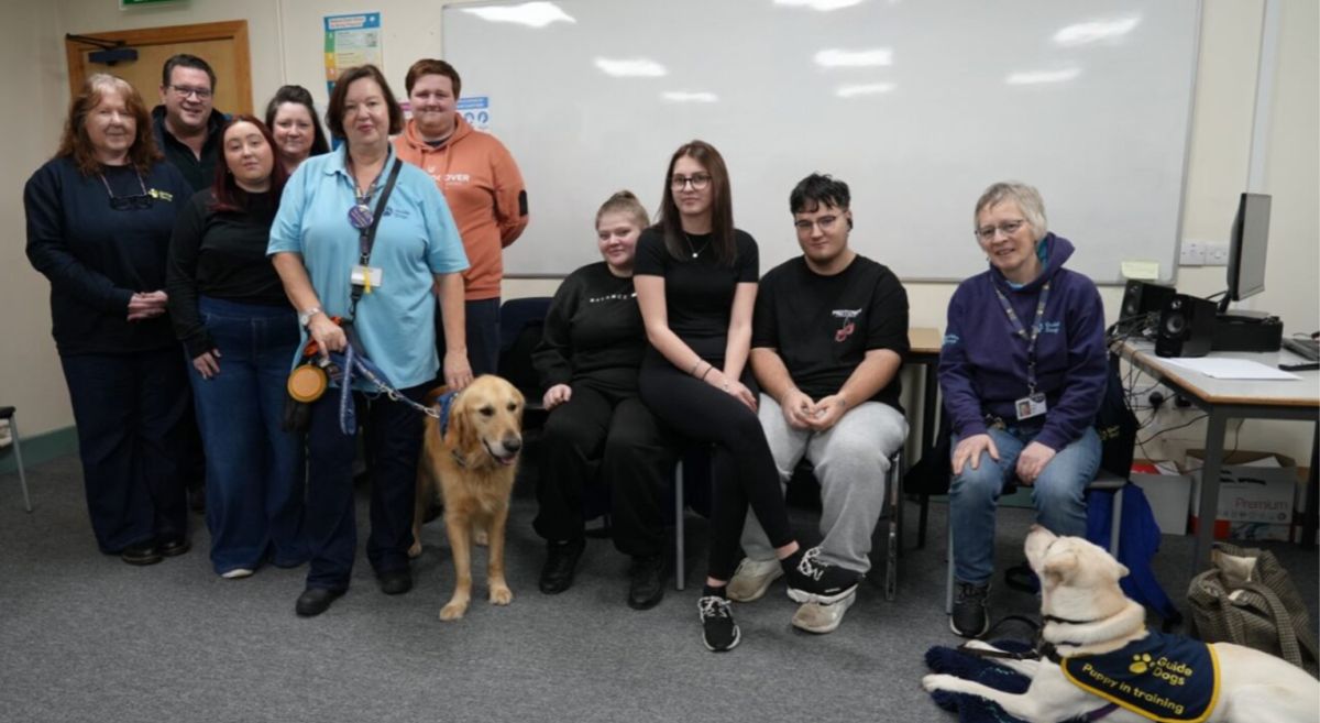 Picture of Guide Dogs NI representatives, dogs, and SERC tutors and students